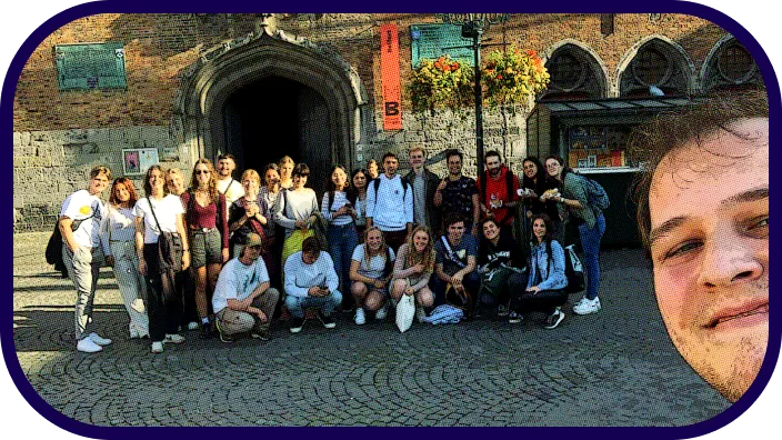 Loris during the oweek with a group of international students behind him